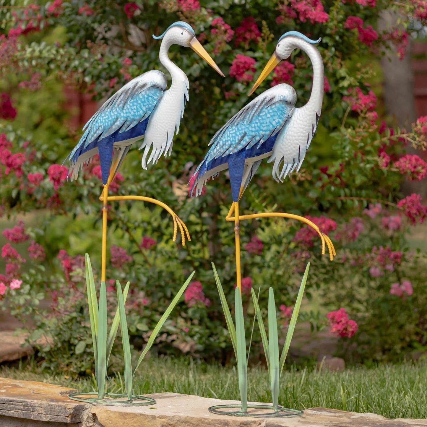 Assorted Blue and White Iron Herons with Cattails