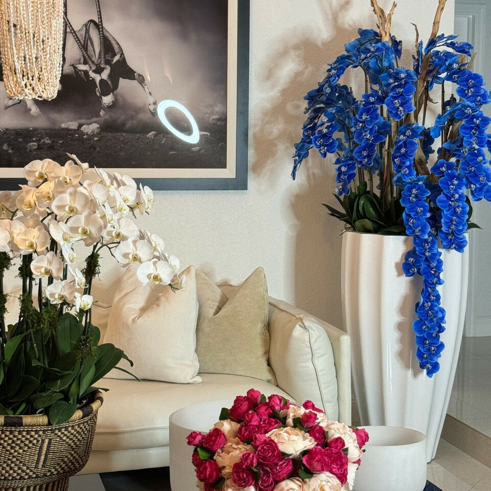 Flower arrangements san jose planter in white with cascading blue orchids