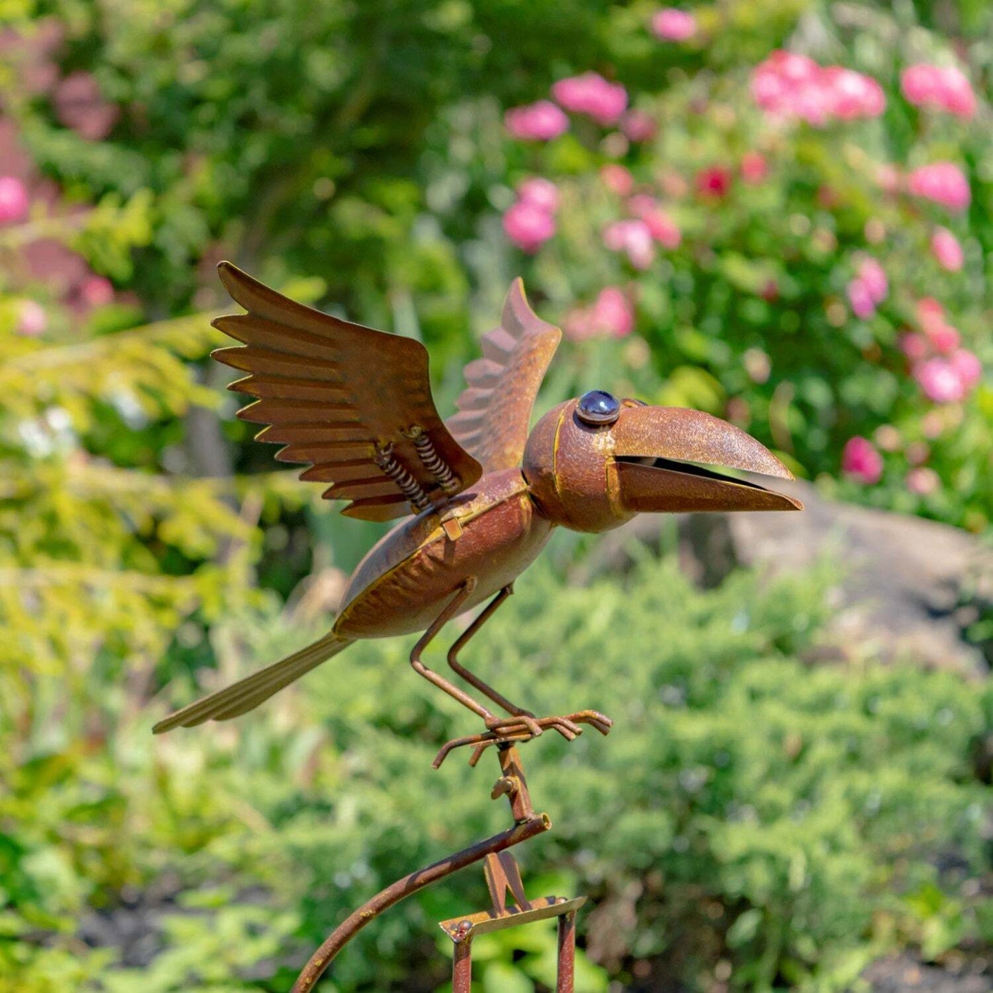 Rusty raven garden swing stake with glass ball