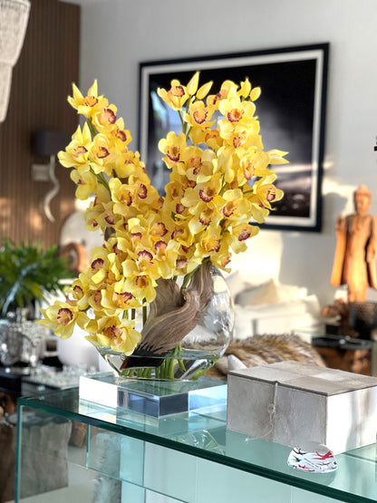 Yellow Cymbidiums in Moon Vase