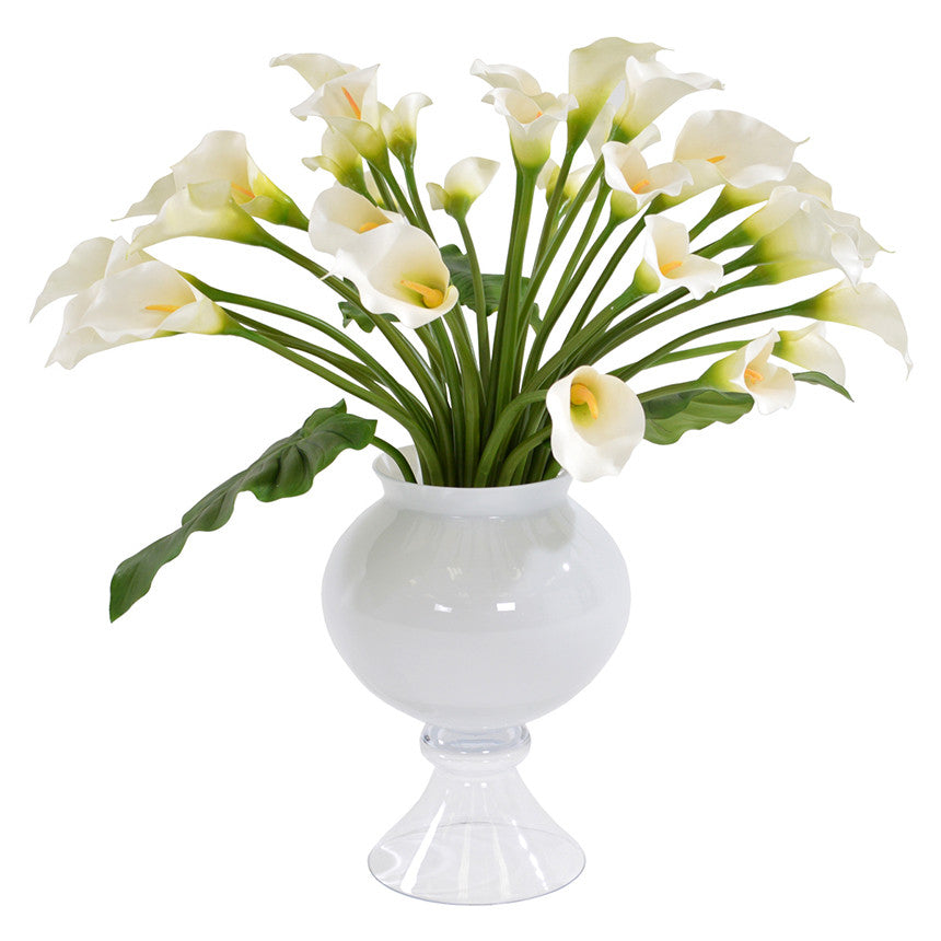 Refine vase with multiple white calla lilies