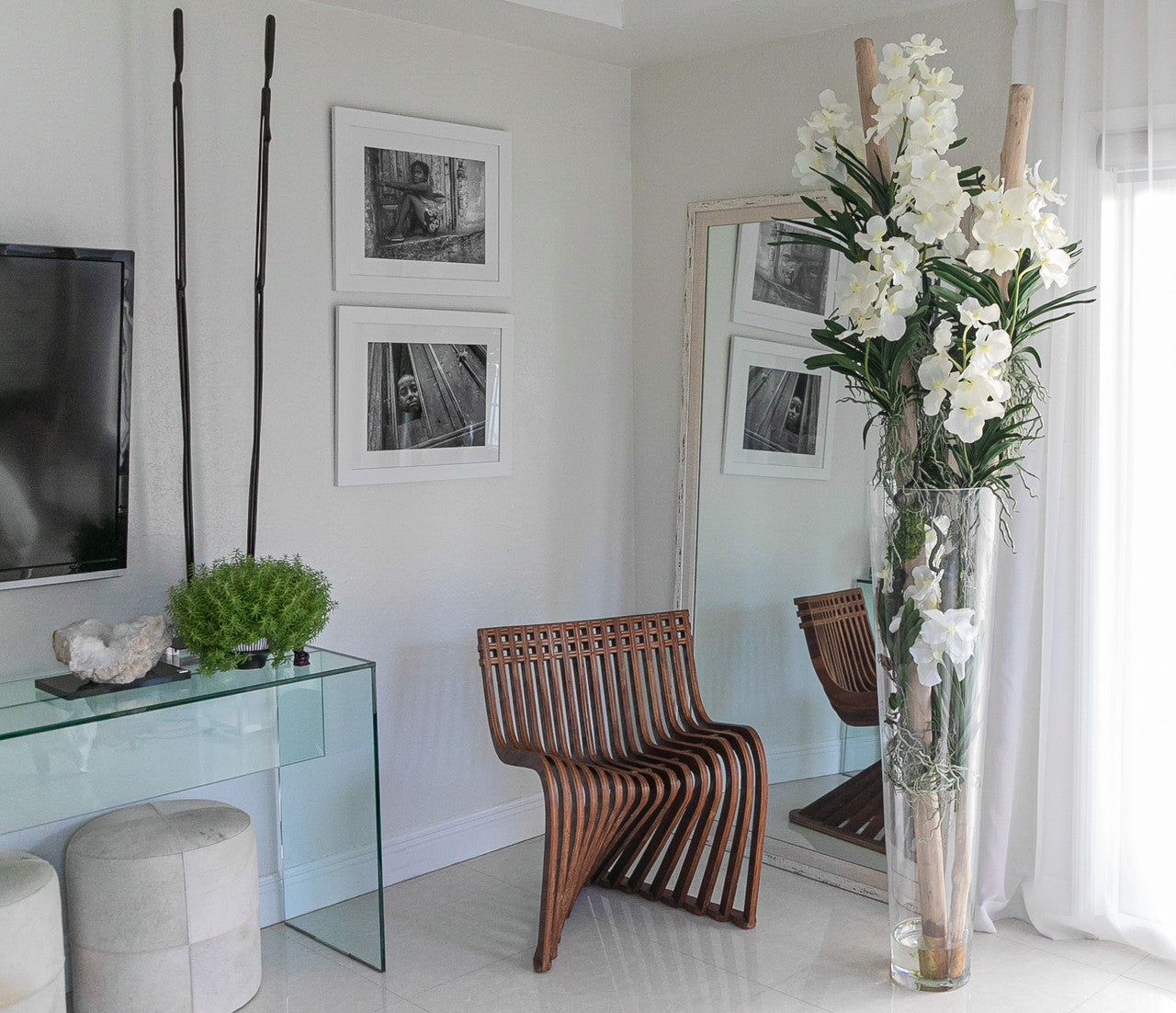 White Vanda Orchids And Driftwood Inside Oversized Tapered Glass Cylinder