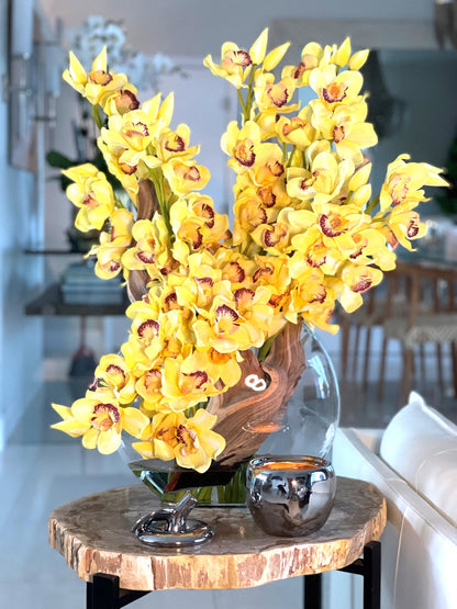 Yellow Cymbidiums in Moon Vase