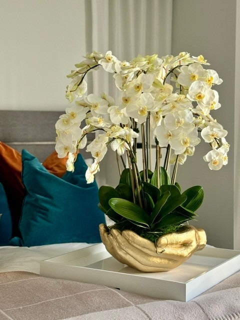 White Phalaenopsis  Orchids in  Gold Open Hands Sculpture Vase