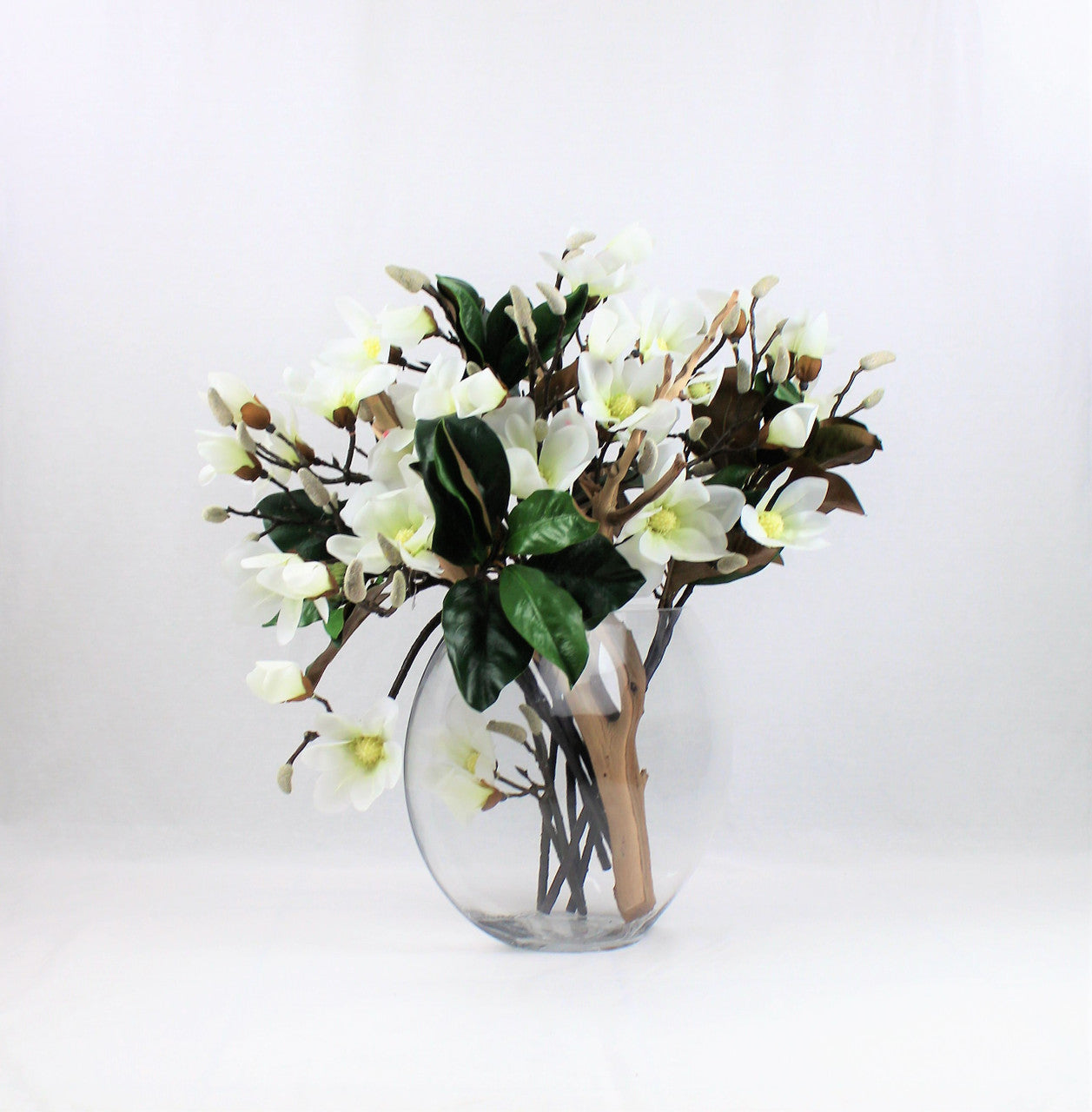 Moon vase with white magnolias