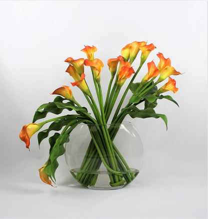 Moon vase with mango calla lilies