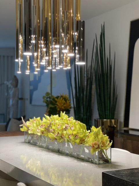 48″ Casa Moderna glass plate planter with green Cymbidium orchids