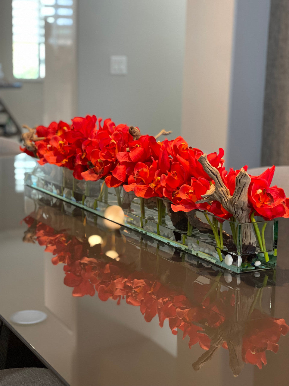 48″ Casa Moderna glass plate planter with red Cymbidiums