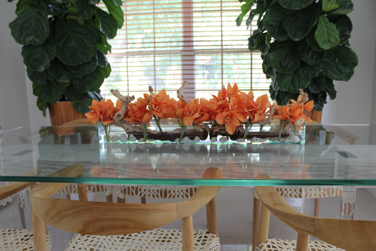 36″ Casa Moderna glass plate planter with orange Cymbidium orchids