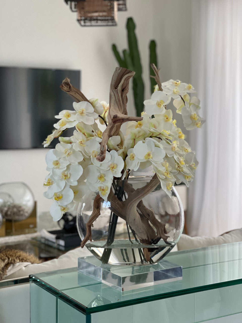 16″ Moon vase with white orchids