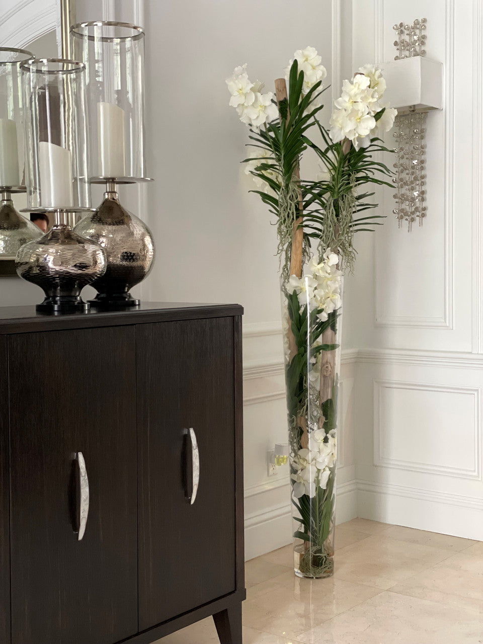 White Vanda Orchids And Driftwood Inside Oversized Tapered Glass Cylinder