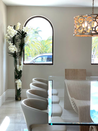 White Vanda Orchids And Driftwood Inside Oversized Tapered Glass Cylinder