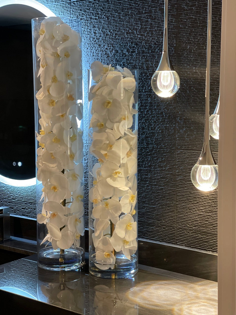 Glass Cylinder With White Phalaenopsis Orchids