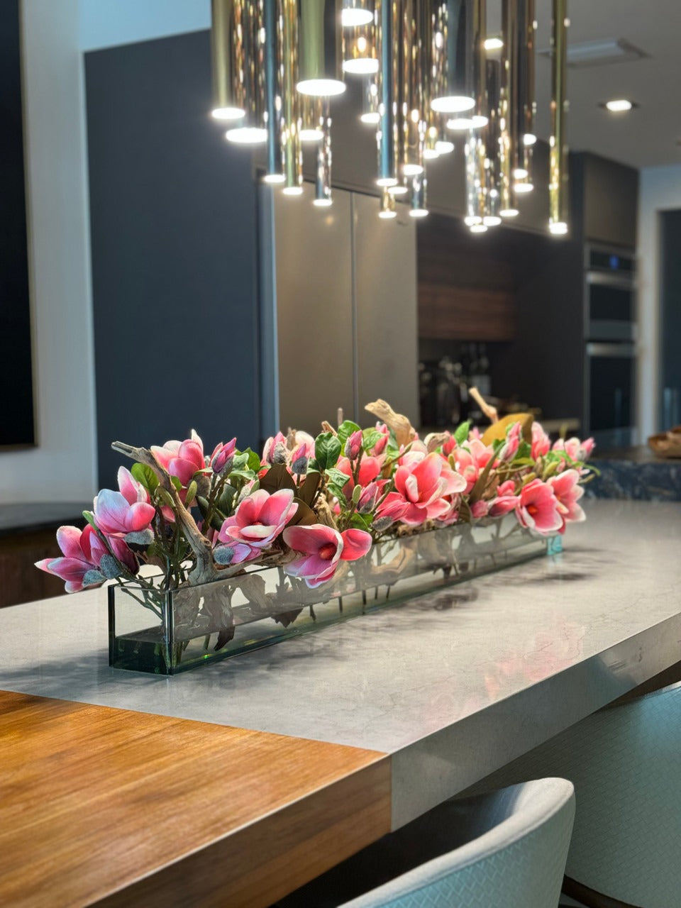 Casa Moderna Glass Planter with Bright Pink Magnolias and Driftwood