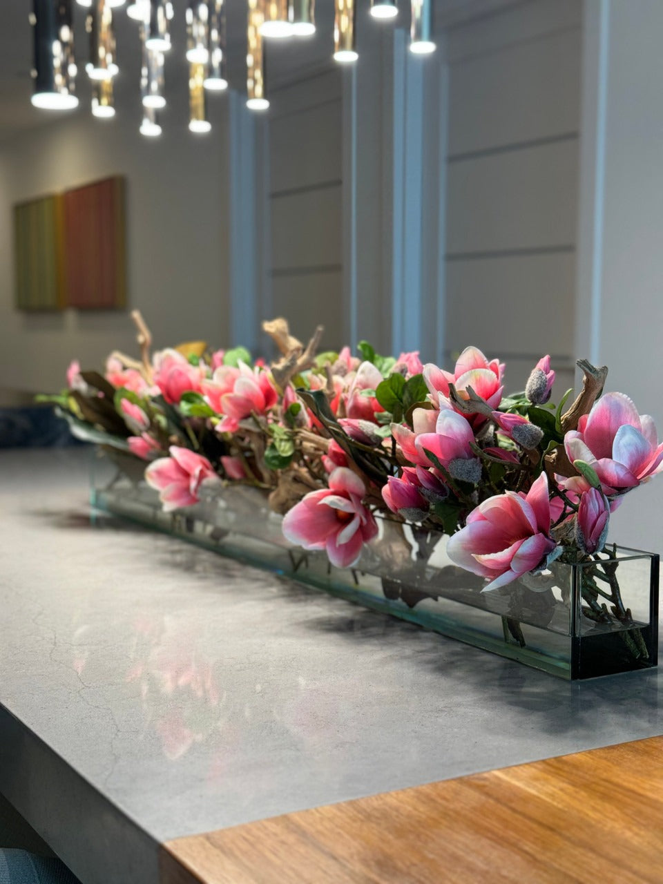 Casa Moderna Glass Planter with Bright Pink Magnolias and Driftwood