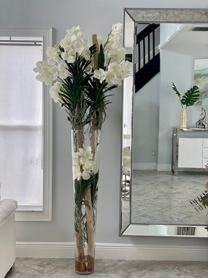 White Vanda Orchids And Driftwood Inside Oversized Tapered Glass Cylinder