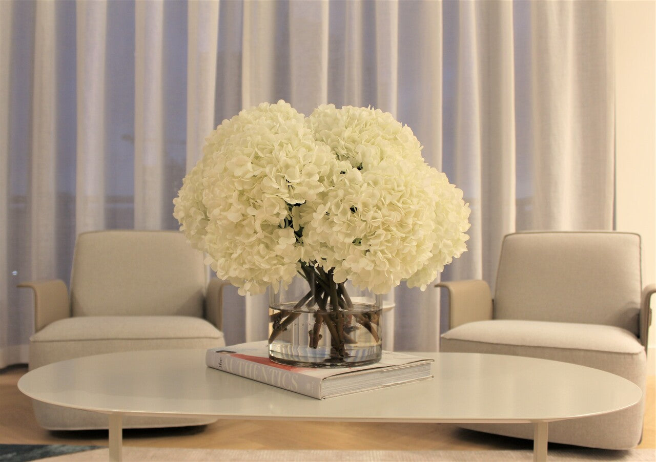 White Hydrangea Bouquet in clear glass cylinder vase