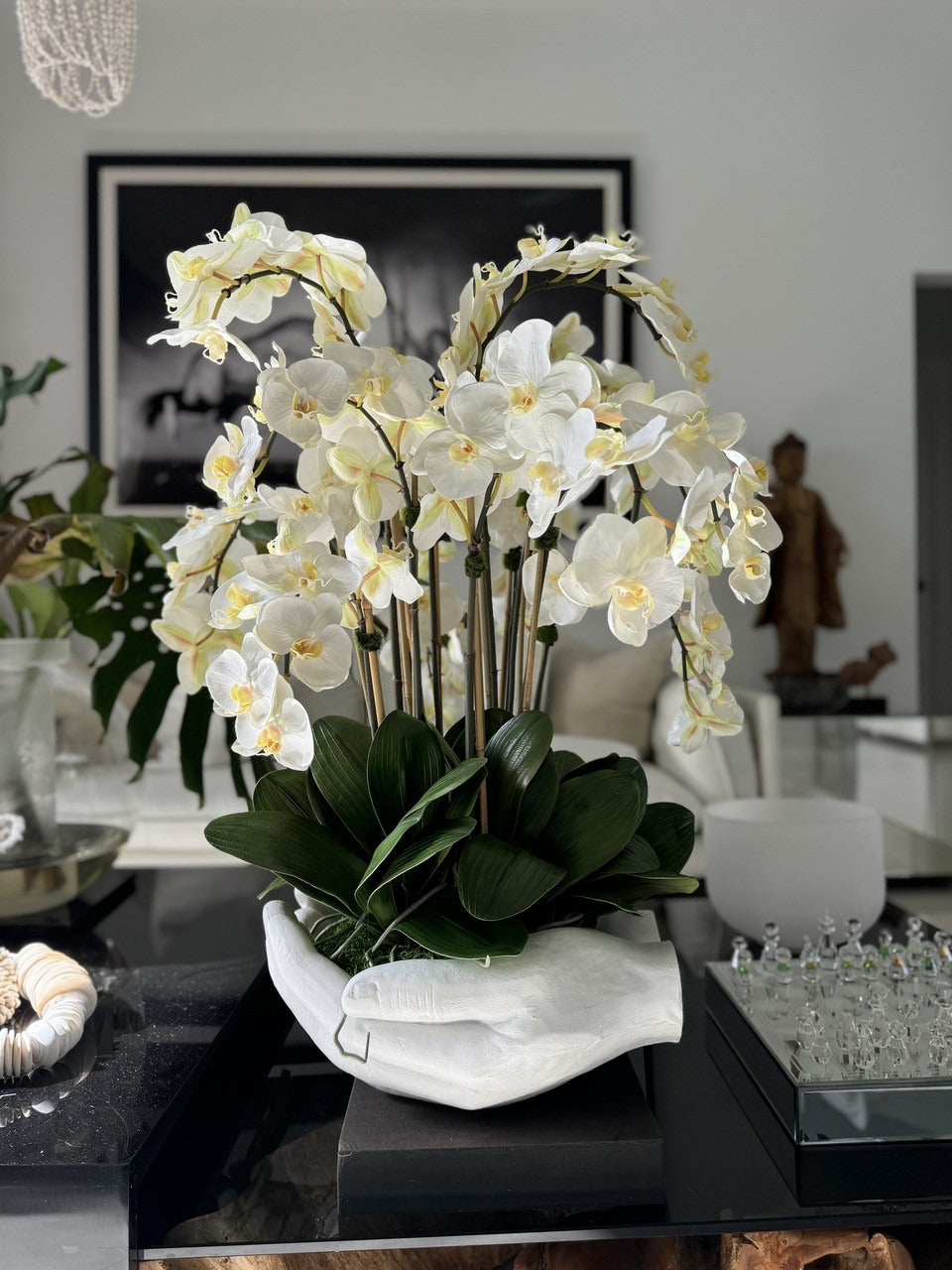 White Phalaenopsis  Orchids in  White Open Hands Sculpture Vase