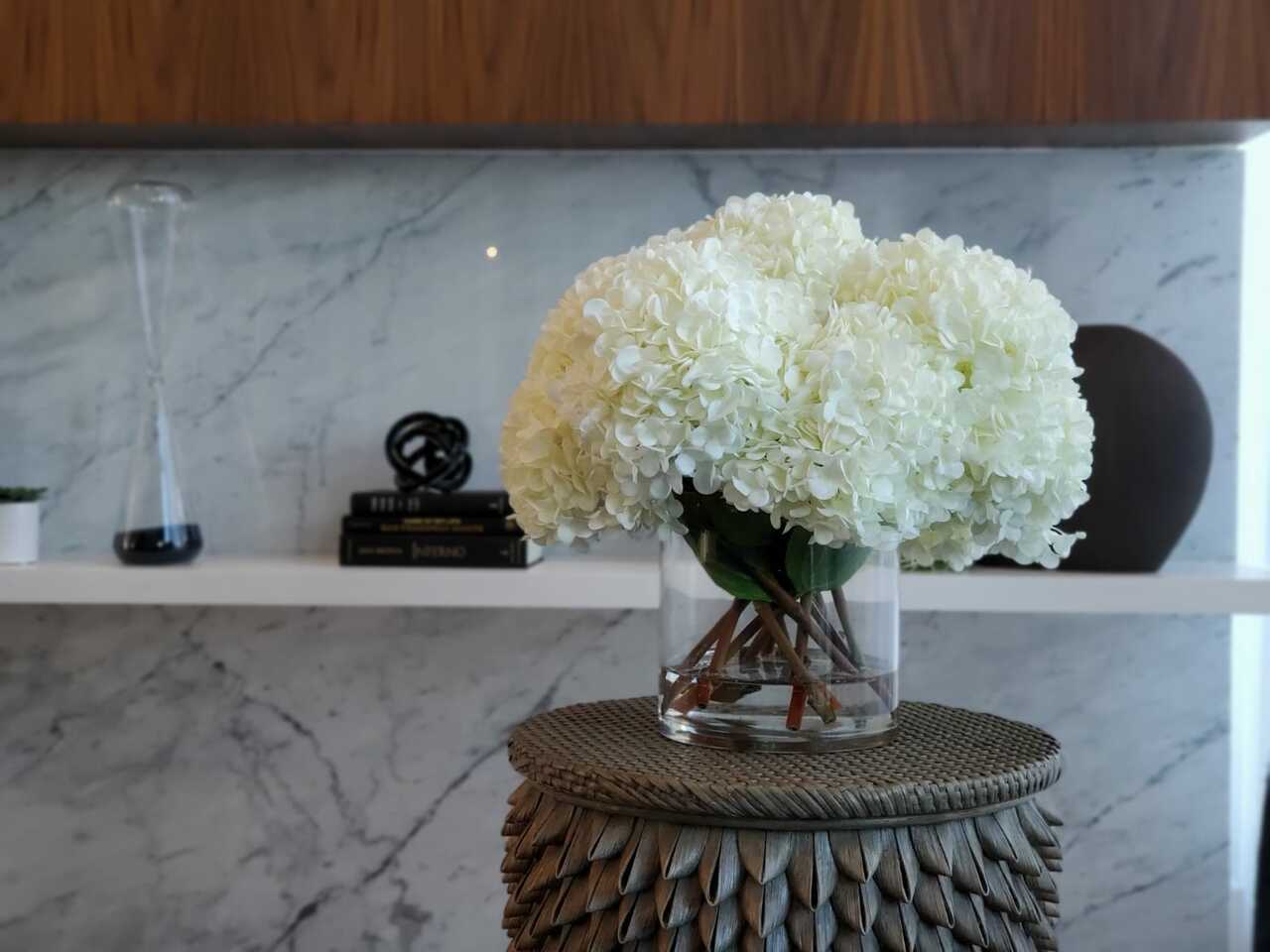 White Hydrangea Bouquet in clear glass cylinder vase