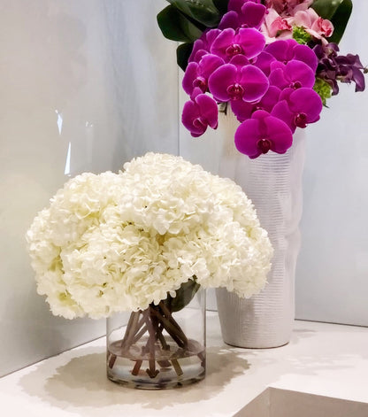 White Hydrangea Bouquet in clear glass cylinder vase