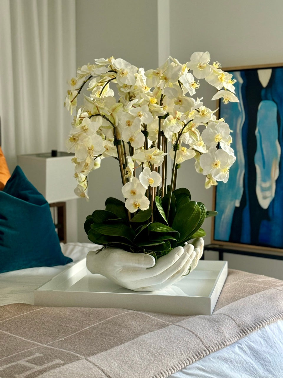 White Phalaenopsis  Orchids in  White Open Hands Sculpture Vase