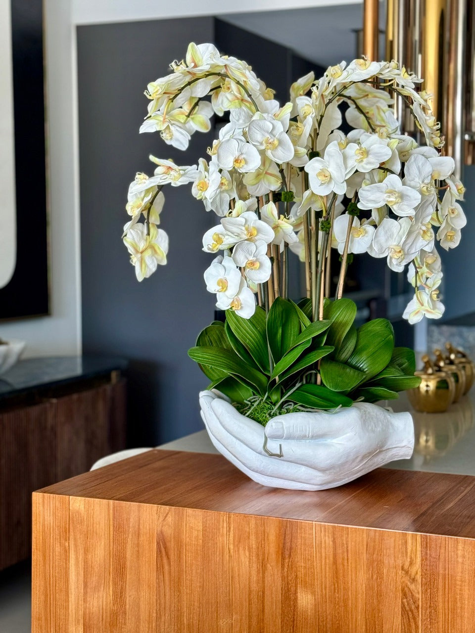 White Phalaenopsis  Orchids in  White Open Hands Sculpture Vase