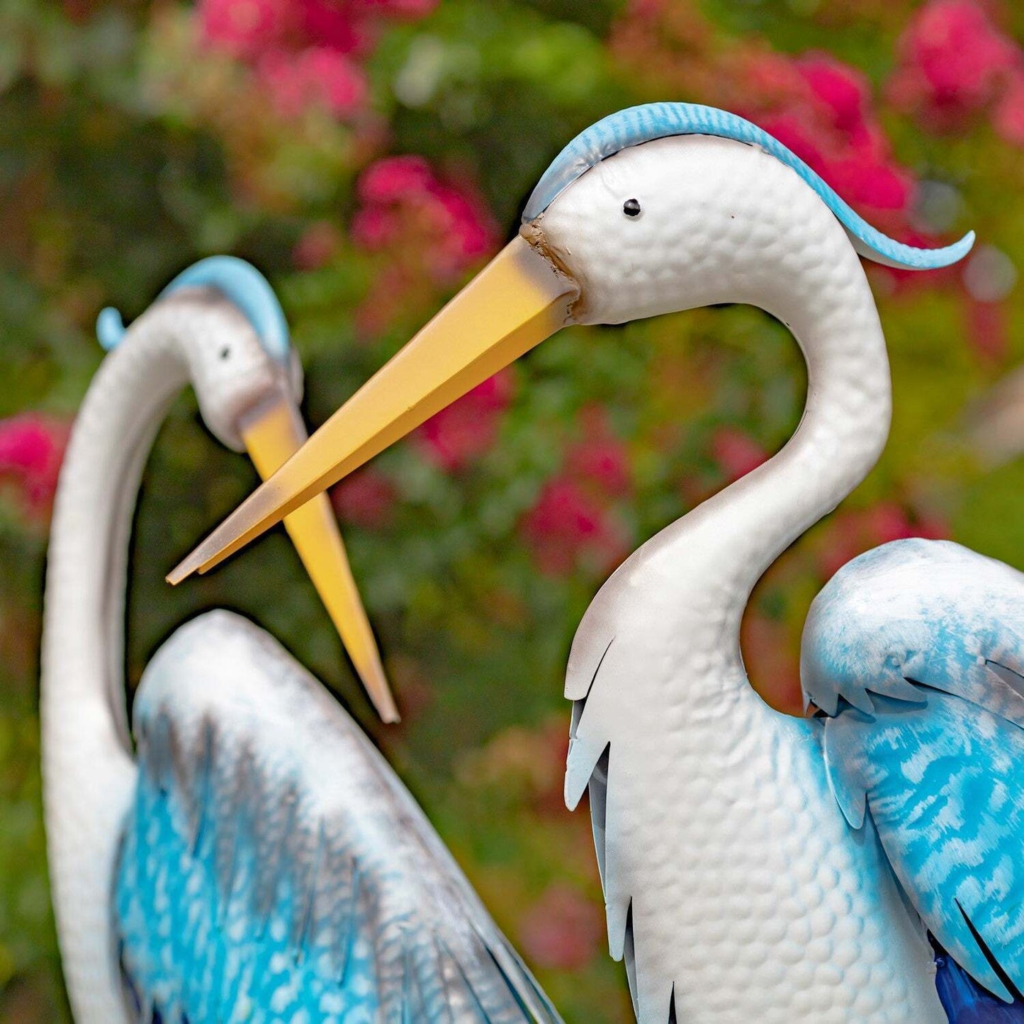 Assorted Blue and White Iron Herons with Cattails