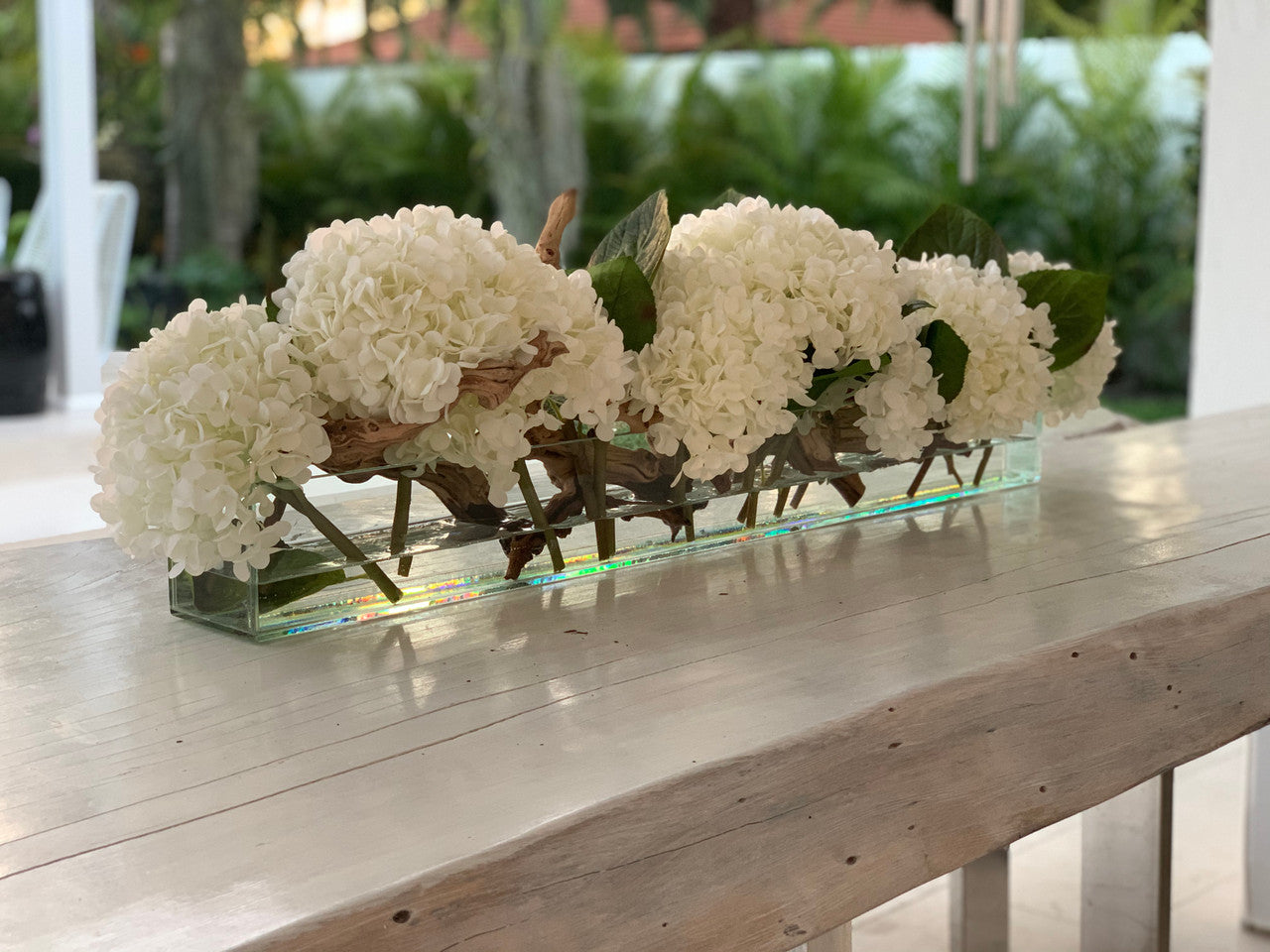 36″ Casa Moderna Glass Plate Planter with white Hydrangeas and Driftwood